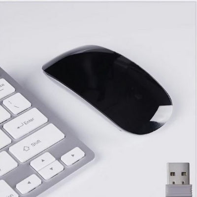 Souris pc sans fil | SlimGlide™ noir sur bureau