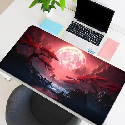 Sous main de bureau Luna Sakura rouge sous un ordinateur portable, vu du dessus
